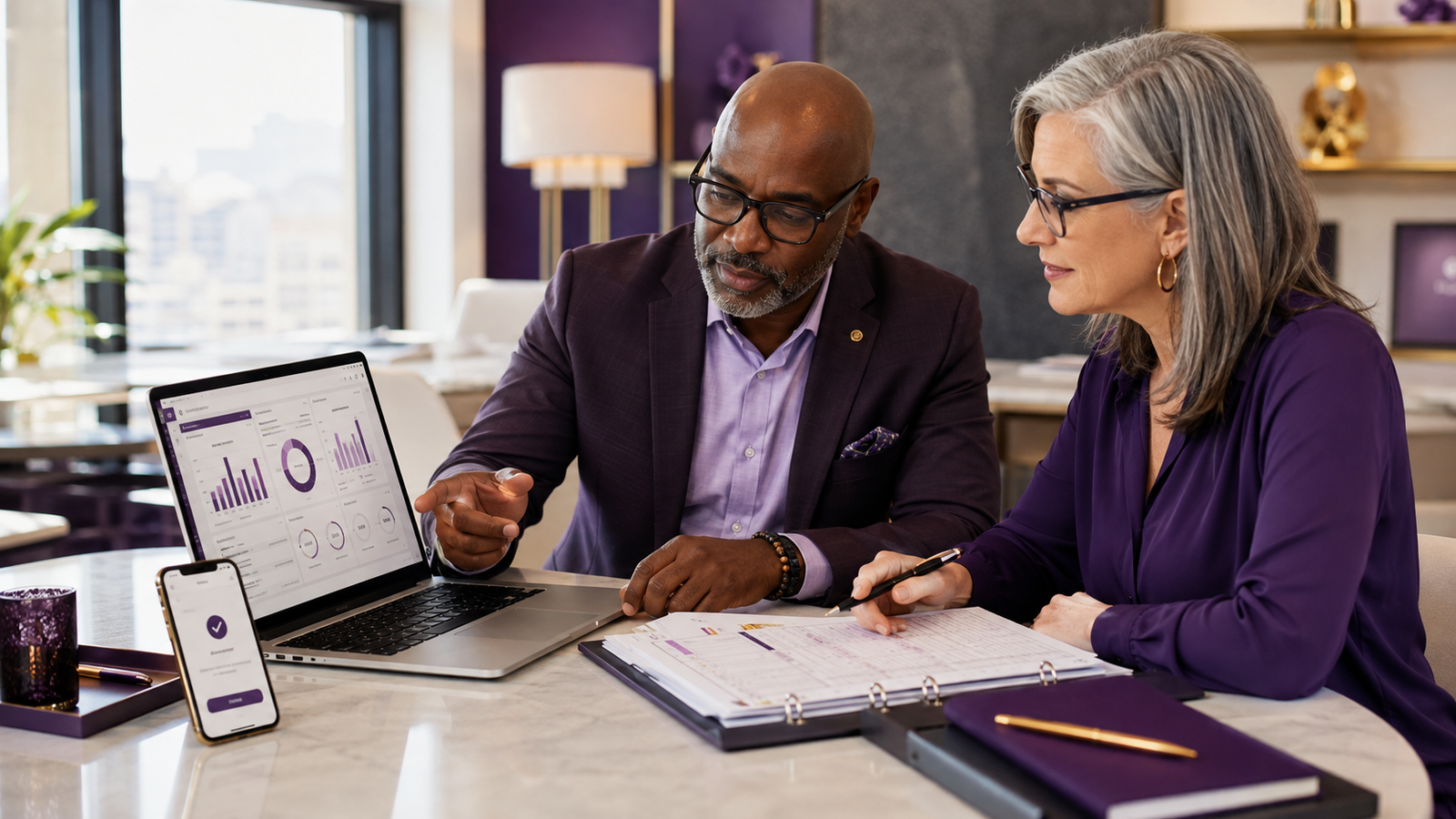 Association treasurer and secretary reviewing member dues records, payment confirmations, and a finance dashboard in a professional plum and lilac workspace